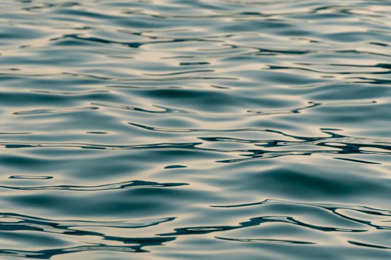The image is of a body of water with small waves on the surface. No surroundings can be seen.